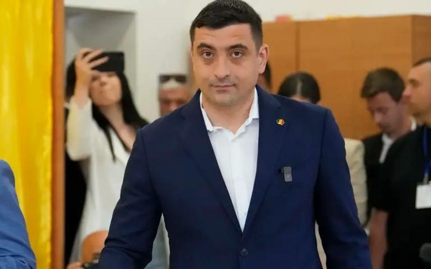 İfrat sağçı siyasətçi Rumıniyada prezident seçkilərinin birinci turunda qalib gəlib